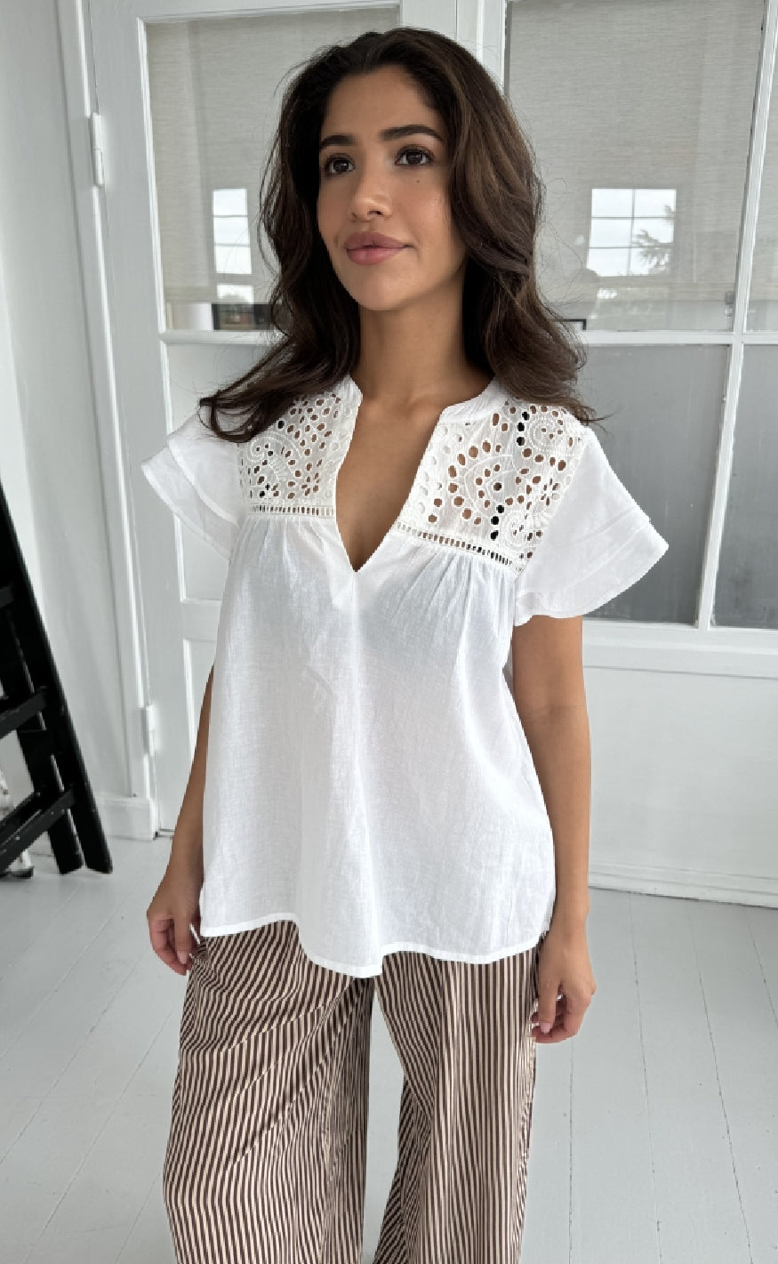Continue Top Christel White